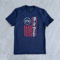 Navy blue t-shirt with a graphic design on a gray textured background